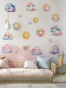 Detailed view of watercolor sun and cloud stickers in a cozy minimalist kids' bedroom decor