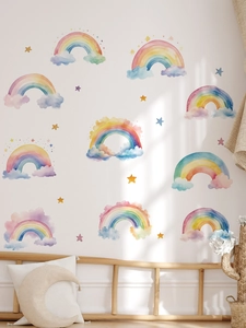 Detailed watercolor rainbow wall decals and stars on a clean white wall for kid rooms
