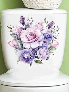 Detail of floral toilet sticker with watercolor purple roses on white ceramic surface
