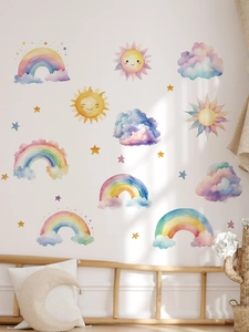 Detail of watercolor rainbow sun wall stickers showing clouds and stars in a kids room