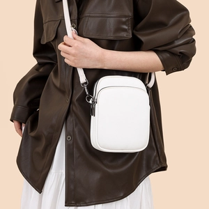 Minimalist white litchi pattern crossbody phone bag with double zipper and PU leather strap