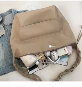 Detailed top view of large nylon tote bag showing spacious interior and storage capacity