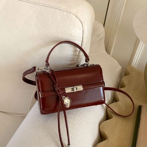 Deep red lychee grain PU leather crossbody bag with silver lock and heart pendant