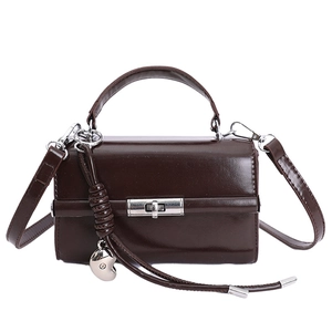 Dark brown lychee texture PU leather shoulder bag with adjustable strap and silver buckle