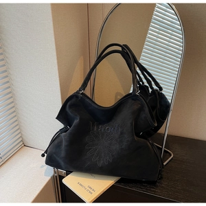 Black suede tote bag with daisy embroidery and Maodi letters for casual daily use