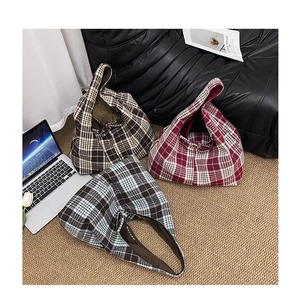 Retro plaid canvas hobo tote bag in red, brown, and blue colors for autumn style