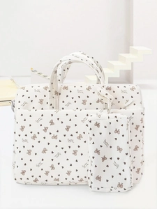 Detail of velvet corduroy laptop bag and pouch set with sweet heart and bow pattern