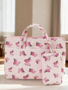 Detail of pink butterfly print laptop sleeve set with matching small accessory pouch