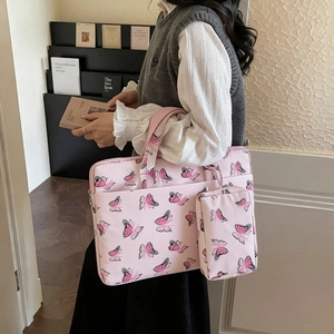 Pink velvet tote bag with butterfly print and matching small pouch for daily commute