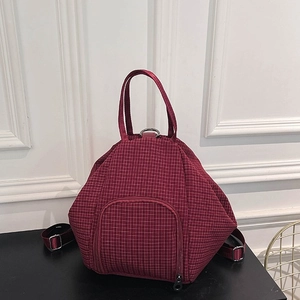 Burgundy textured dumpling bag with large capacity and versatile shoulder straps
