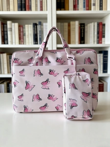 Pink velvet laptop bag and matching accessory pouch with elegant purple butterfly print