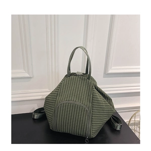 Green checkered dumpling bag with adjustable shoulder straps and top handles for women