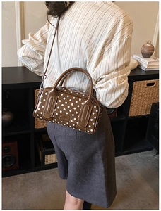 French retro polka dot boston bag with double handles and brown patent leather texture