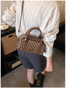 French vintage style brown polka dot Boston handbag with a detachable shoulder strap