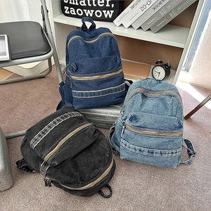 Sac à dos rétro en denim pour femme en trois couleurs avec grande capacité et poches