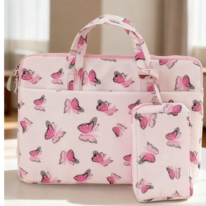 Pink velvet laptop sleeve with butterfly print including a matching power adapter pouch