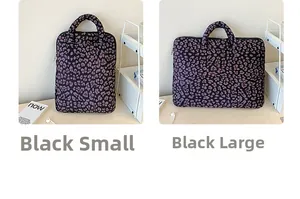 Detail view of purple leopard print plush laptop sleeves in two sizes on a white desk