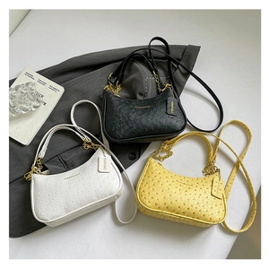 Ostrich pattern crescent shoulder bags in black, white and yellow with chain straps
