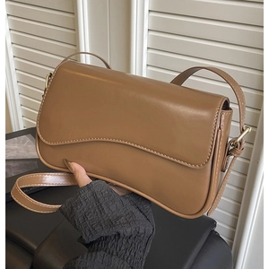 Vintage caramel brown wave flap shoulder bag with white contrast stitching and gold hardware