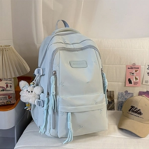 Minimalist mint green laptop backpack with bow embroidery and plush rabbit pendant
