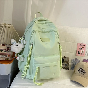 Minimalist mint green large nylon backpack with bow embroidery and plush bunny pendant