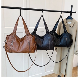 Vintage tote bags in brown, coffee, and black leather with rivets and large capacity