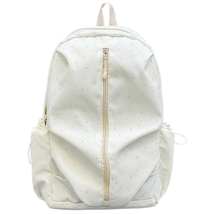 Cream school backpack with blue stars and musical notes pattern on a white background
