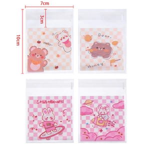 Detalle de cuatro bolsas autoadhesivas de 7x10cm con varios motivos de animales
