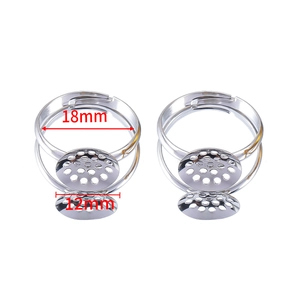 Detailed view of adjustable silver metal ring blanks with 12mm round mesh base and 18mm diameter