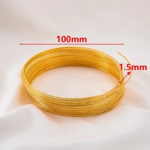 Close-up of golden multilayer steel wire coil with 100mm diameter and 1.5mm wire thickness