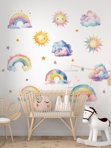 Nursery scene showing watercolor rainbow and sun wall stickers on a minimalist bedroom wall
