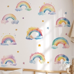 Watercolor rainbow wall decals with stars for nursery decoration on white walls