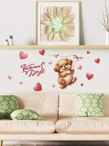 Detail showing a cute puppy with red hearts wall sticker in a cozy living room decor scene