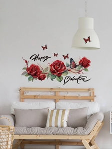 Close-up of red rose wall decals with Happy Valentine text and butterflies on a white wall