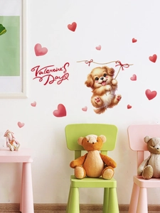 Detail view of Valentine's Day puppy wall stickers with pink hearts in a cozy nursery setting