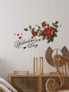 Detail of red rose wall decal with Valentine's Day text and hearts on wood wall