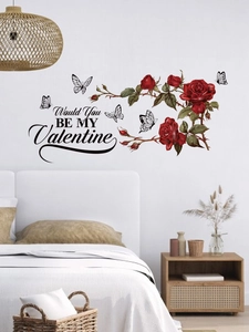 Detailed view of red rose wall stickers with butterfly accents and Valentine typography