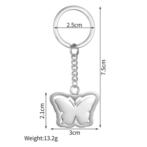 Polished stainless steel butterfly keychain showing dimensions and product weight
