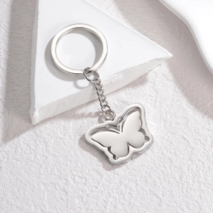 Polished silver stainless steel butterfly keychain with double-layer hollow design