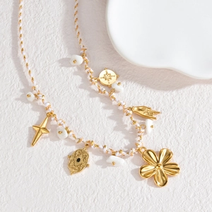 Bohemian braided cord necklace with gold geometric charms and natural crushed stones