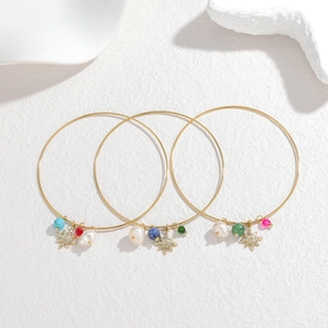 Three 18k gold stainless steel bangles with pearl, cross, and colorful beads