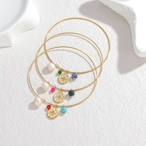 Three-piece 18k gold plated stainless steel bangles with baroque pearl and coin charms