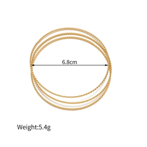 Set van 3 gouden gevlochten armbanden met 6,8 cm diameter en een gewicht van 5,4 g