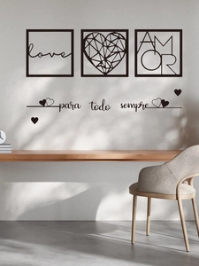 Detail of black abstract wall art stickers with love text and heart in a modern living room
