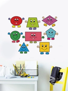 Detail view of colorful cartoon geometric wall stickers on white wall above kid desk