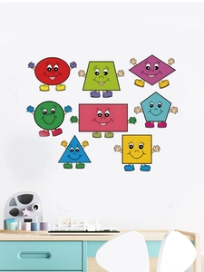 Detailed view of colorful anthropomorphic geometric wall stickers on a clean white wall