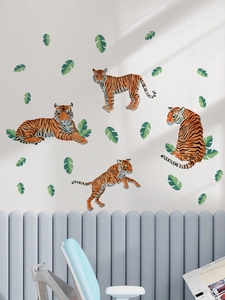 Detailed wall sticker showing four hand-drawn orange tigers and green tropical leaves