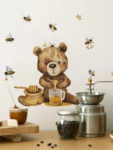 Detail view of cartoon bear and honey bees wall stickers in a cozy kitchen setting