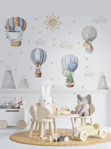 Detailed view of watercolor hot air balloon dinosaur wall stickers in a cozy nursery room