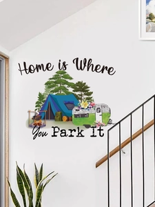 Detail of camping wall sticker featuring a vintage camper and trees on a white wall